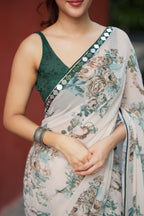 Half white chiffon floral saree with hand work blouse