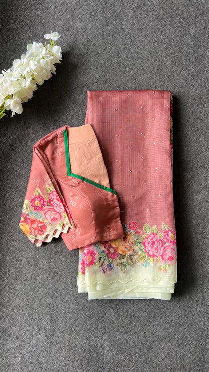 Peach floral kota doria saree with patterned blouse