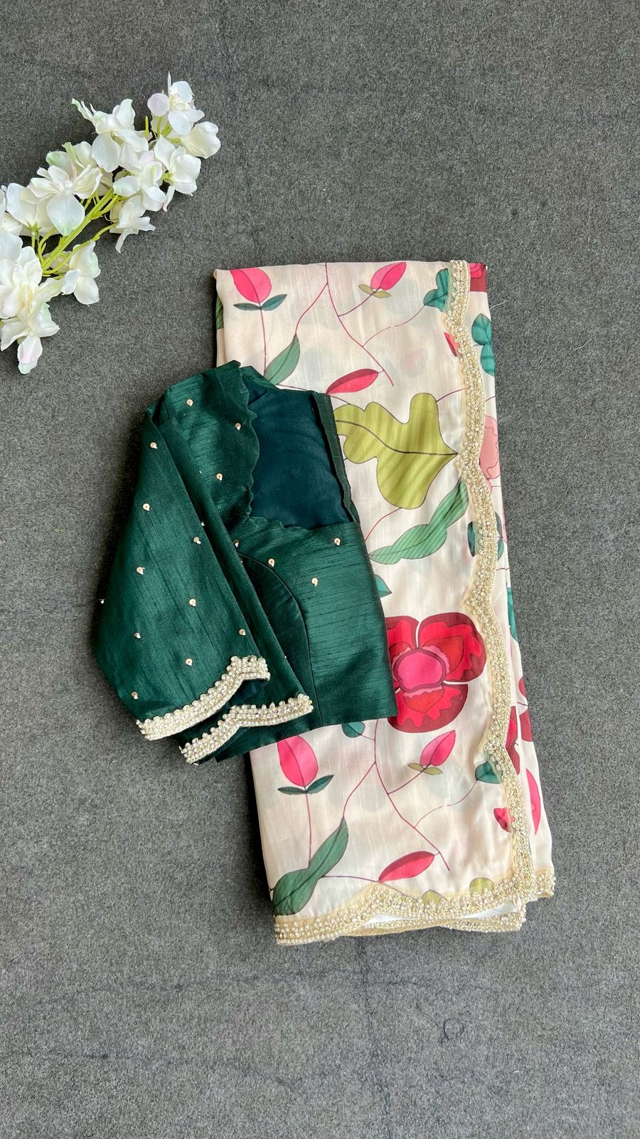 Half white floral kossa saree with green hand worked blouse