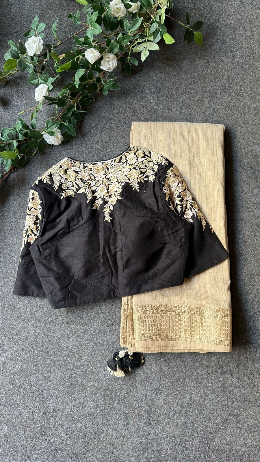 Golden cream tissue saree with black hand work blouse