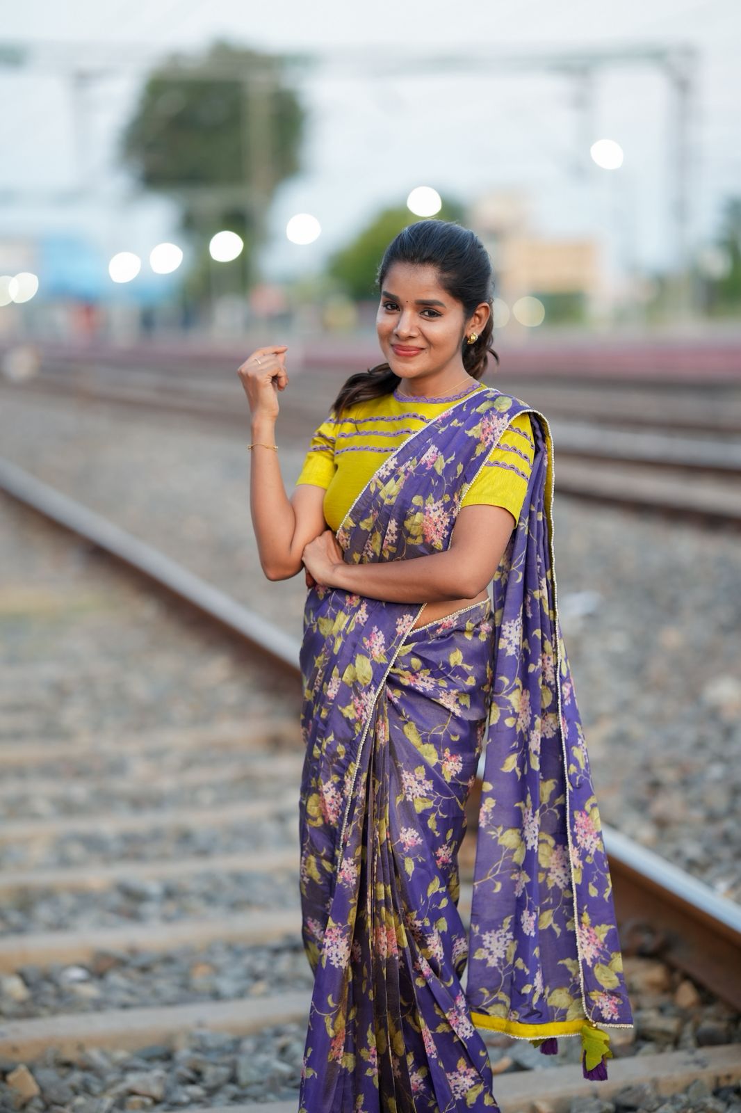 Blue floral tissue saree with lime hand work blouse