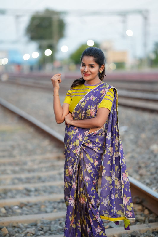 Blue floral tissue saree with lime hand work blouse