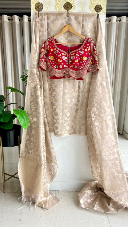 Half white banarasi saree with deep pink silk hand embroidery blouse