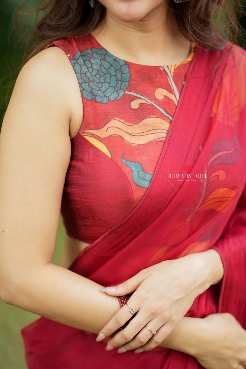 Maroon soft organza saree with kalamkari blouse