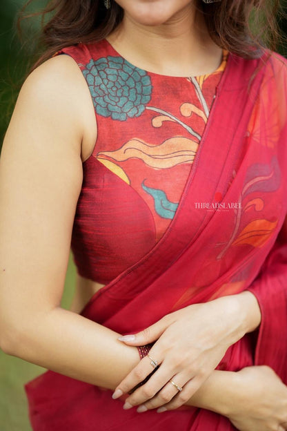 Maroon soft organza saree with kalamkari blouse