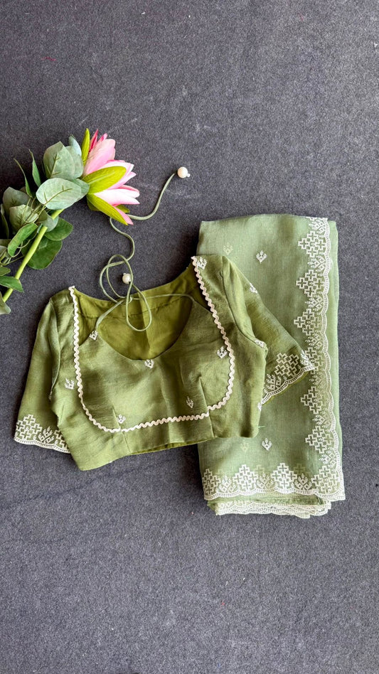 Light green tissue saree with tissue embroidery blouse