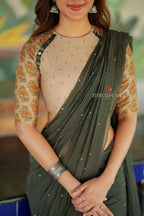 Bottle green mul chanderi saree with mirror work blouse