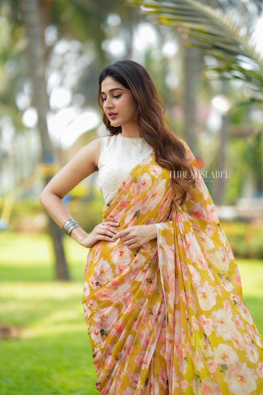 Fenugreek chiffon floral saree with linen mirror blouse