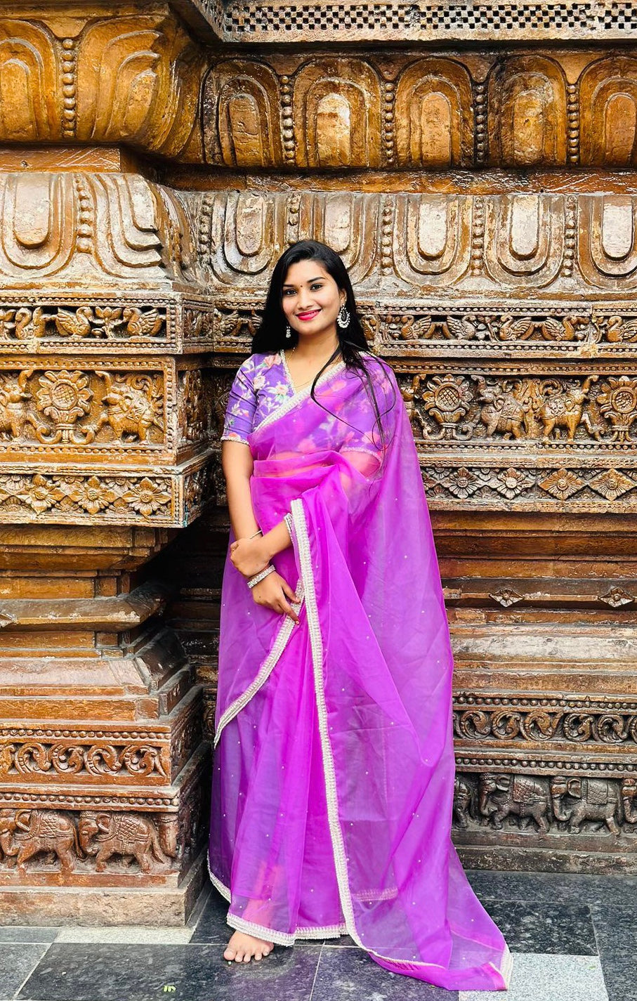 Lavender organza saree with pearl hand work blouse