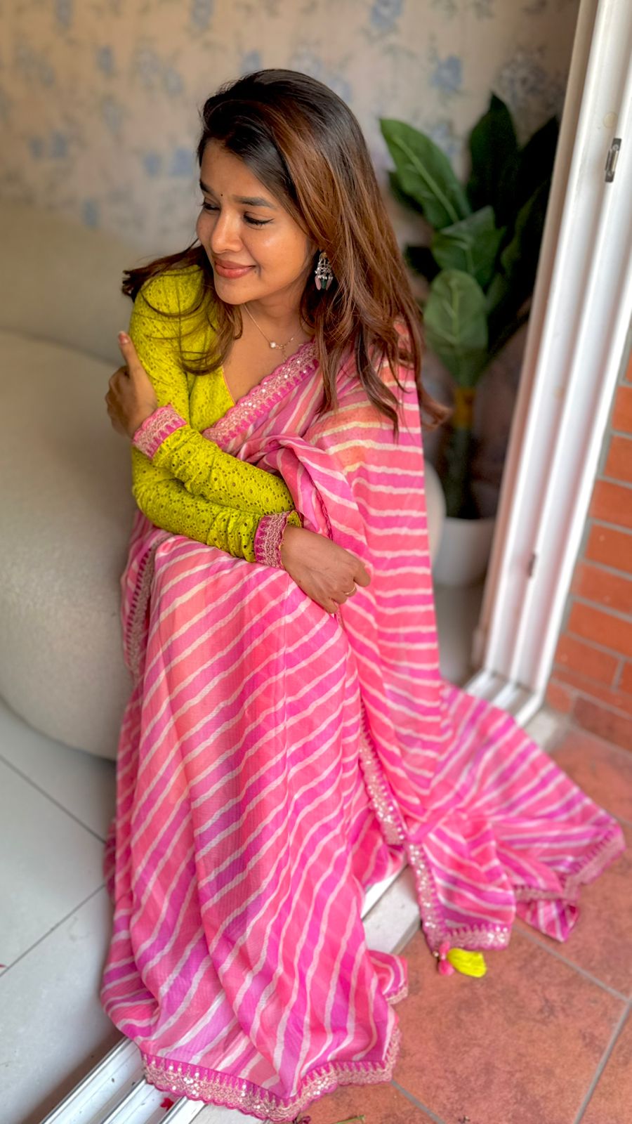 Pink lehariya saree with green hakoba embroidery blouse