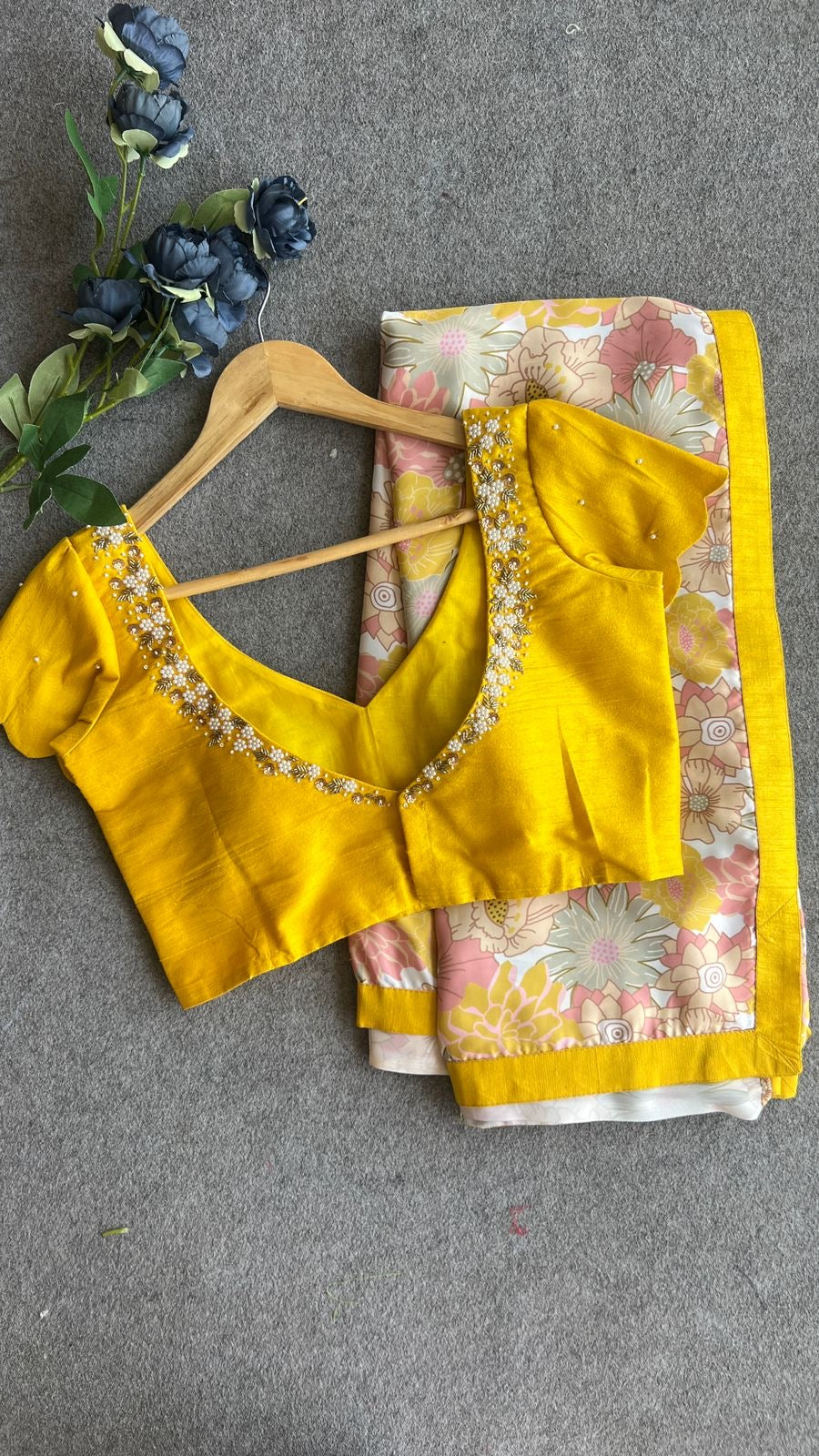 Yellow viscose floral saree with hand worked blouse