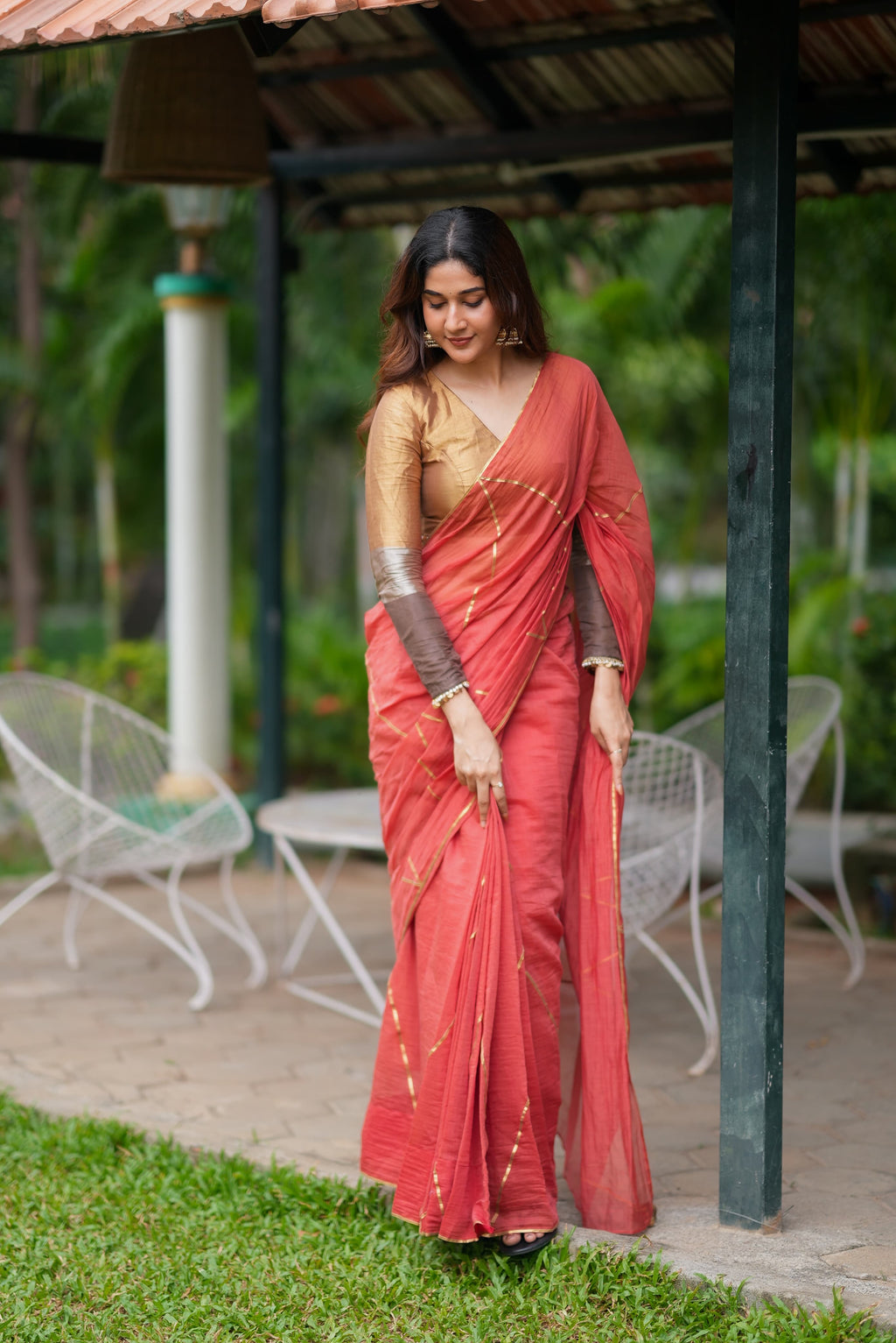 Orange rust saree with tissue handwork blouse