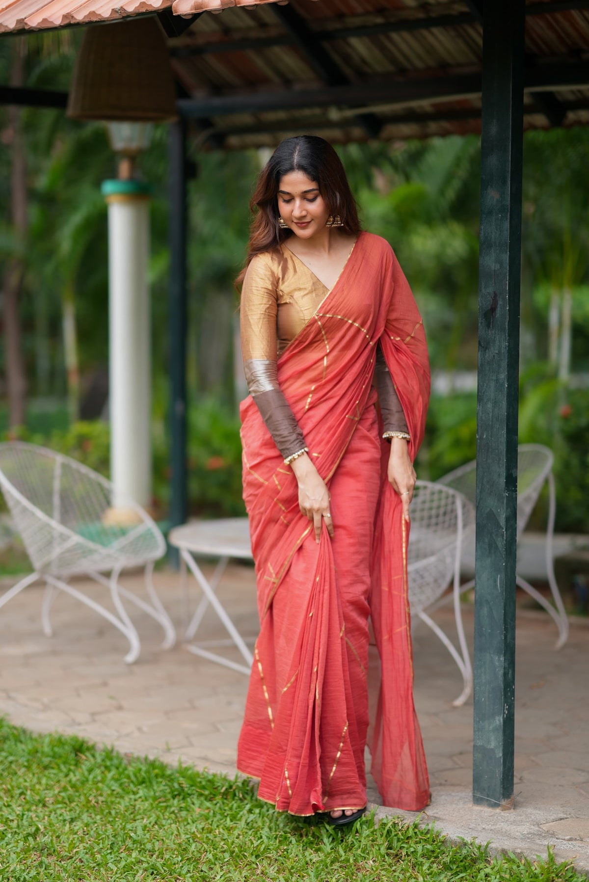 Orange rust saree with tissue handwork blouse
