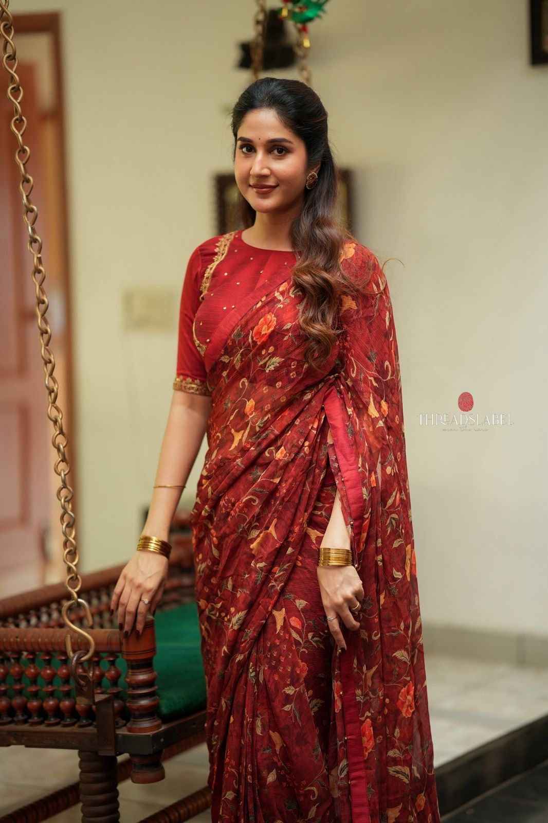 Maroon chiffon floral saree with hand work blouse