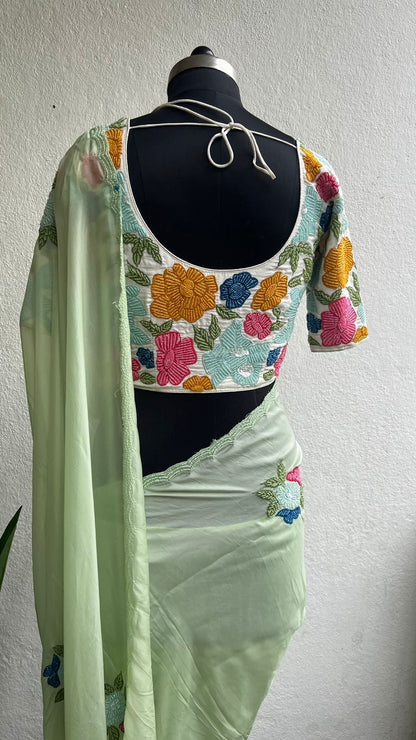 Pista green hand made organza saree & blouse