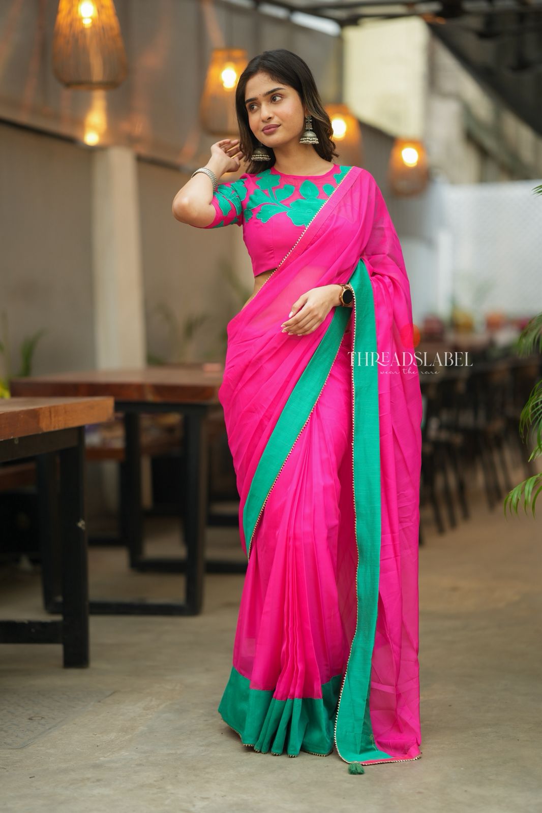 Pink organza saree with floral hand work blouse