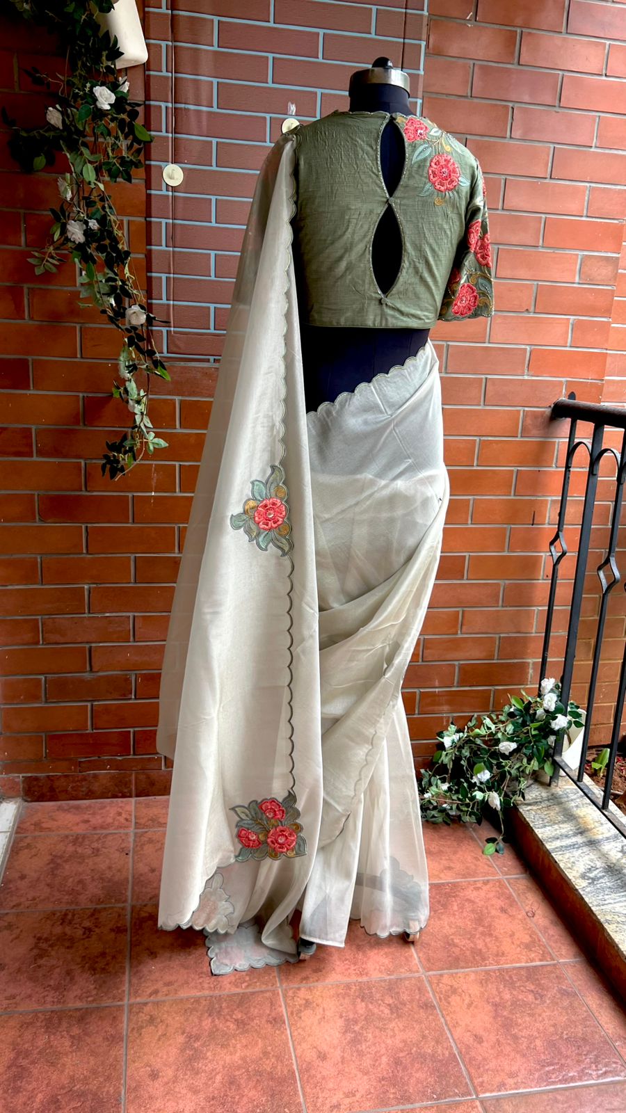 Half white textured organza saree with heavy handwork blouse