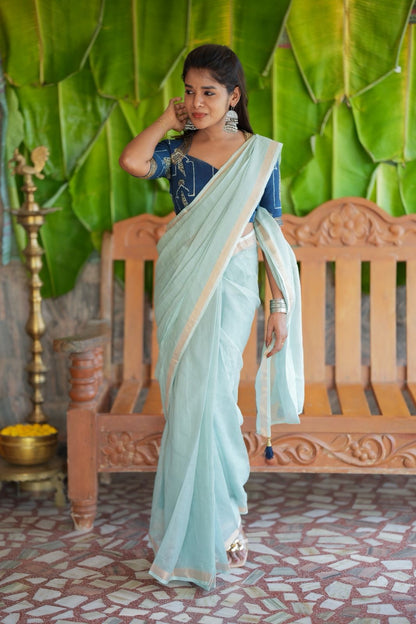 Aqua blue kota doria saree with hand work blouse