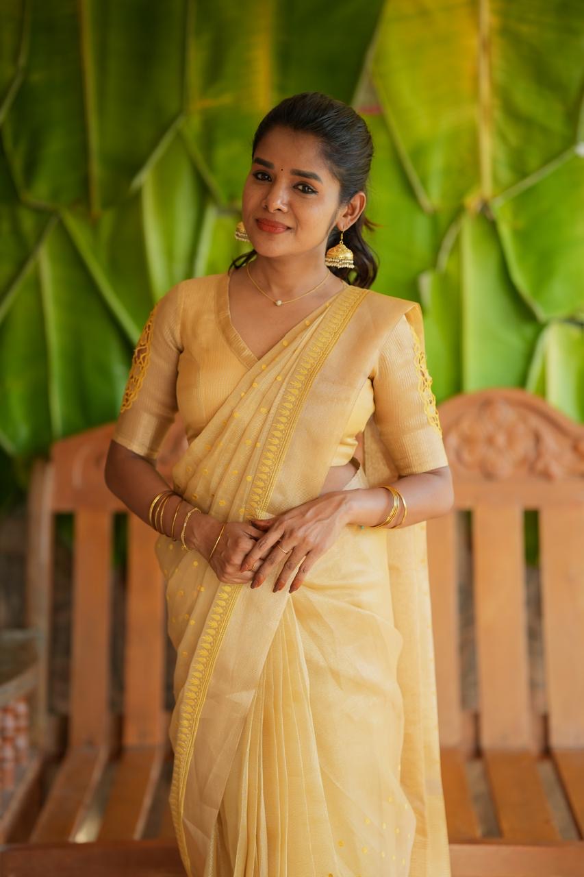 Gold kota doria saree with hand work blouse