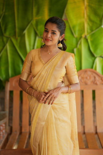 Gold kota doria saree with hand work blouse