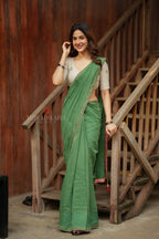 Green mul chanderi saree with halfwhite embroidery blouse