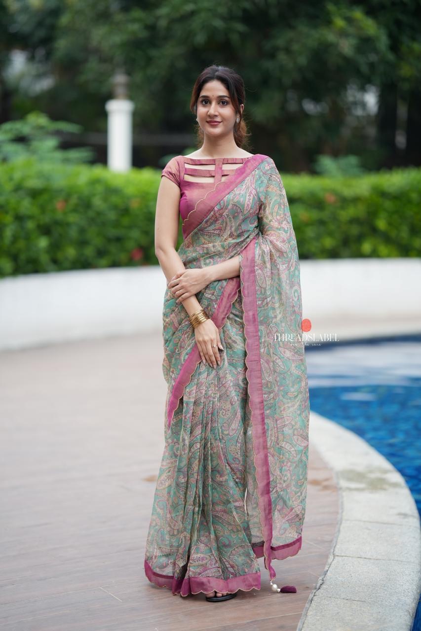 Jade green viscose jute saree with pink tissue blouse