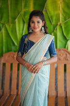 Aqua blue kota doria saree with hand work blouse