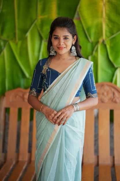 Aqua blue kota doria saree with hand work blouse