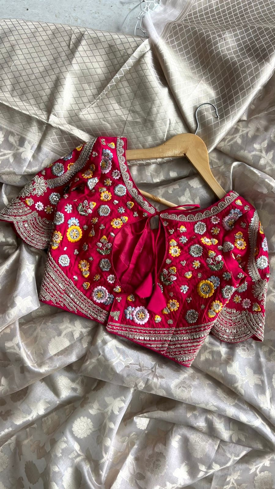 Half white banarasi saree with deep pink silk hand embroidery blouse