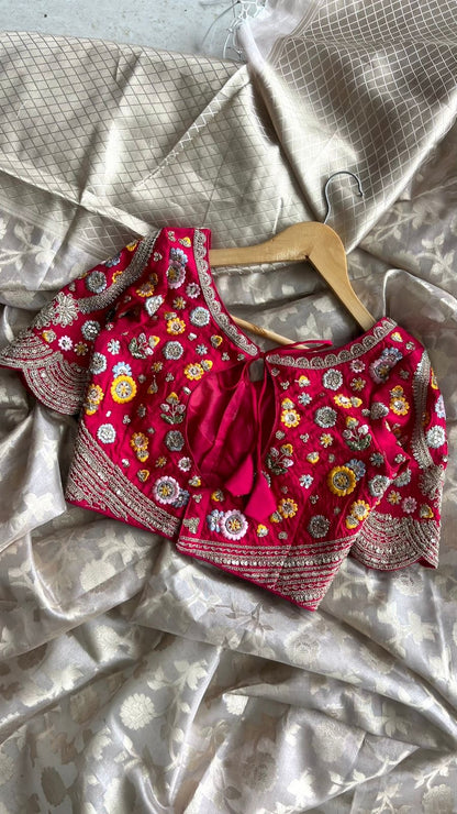 Half white banarasi saree with deep pink silk hand embroidery blouse