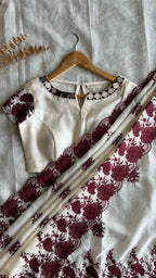 Cream kota cotton saree with mirror work blouse