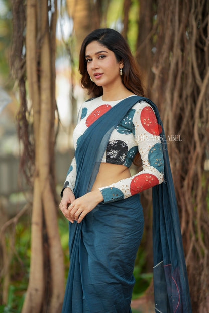 Blue mul chanderi saree with embroidery ajrak blouse