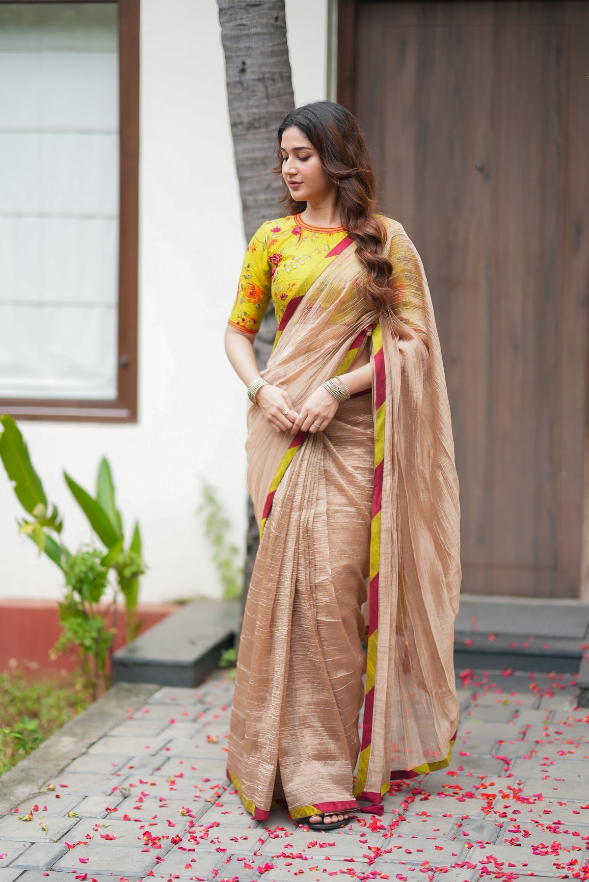 Antique gold tissue saree with parrot handwork blouse