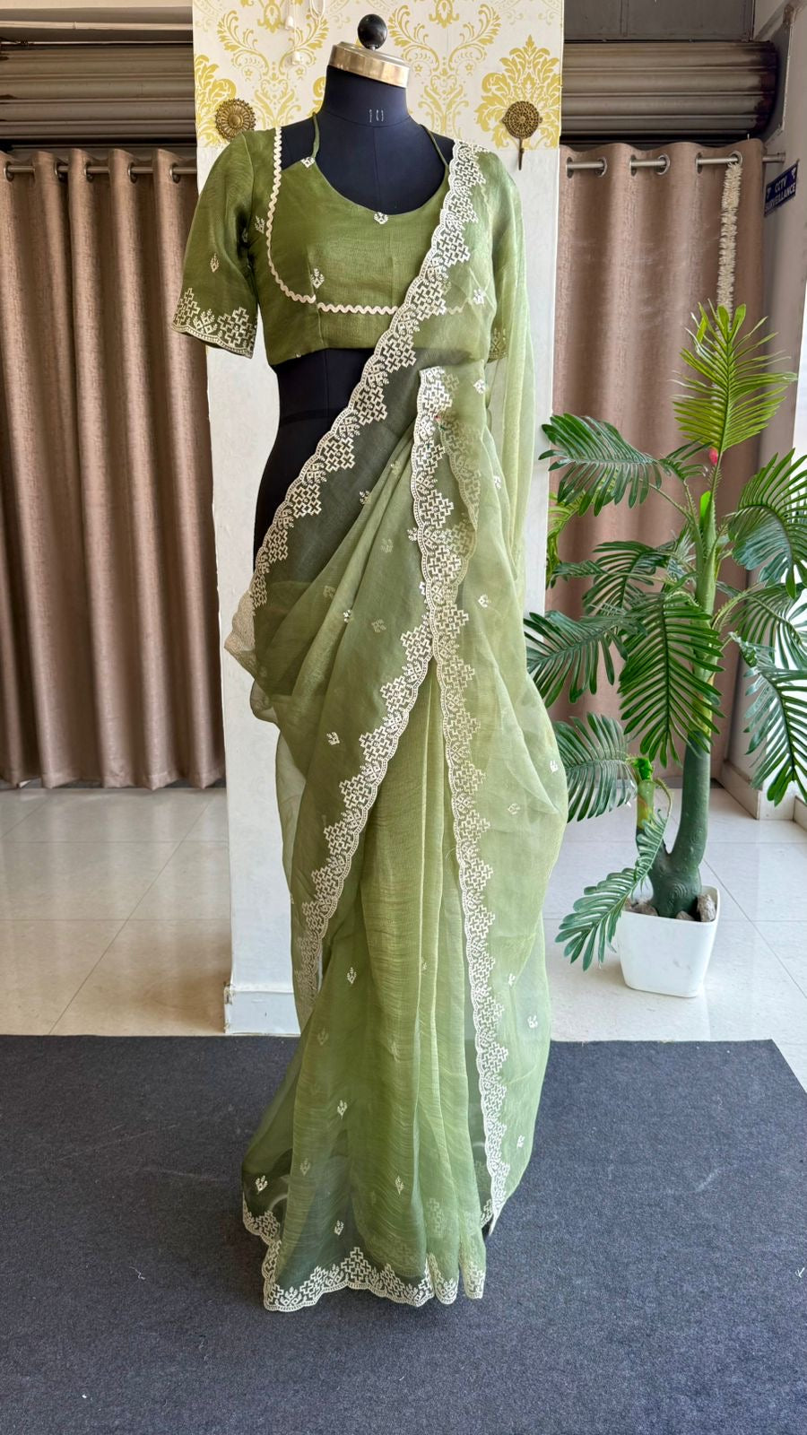 Light green tissue saree with tissue embroidery blouse