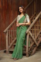 Green mul chanderi saree with halfwhite embroidery blouse