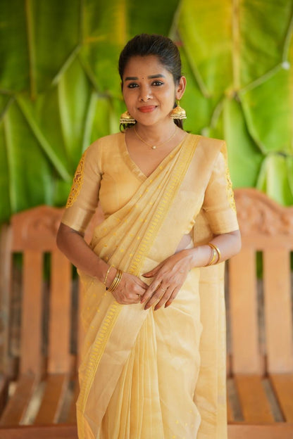 Gold kota doria saree with hand work blouse