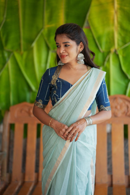 Aqua blue kota doria saree with hand work blouse