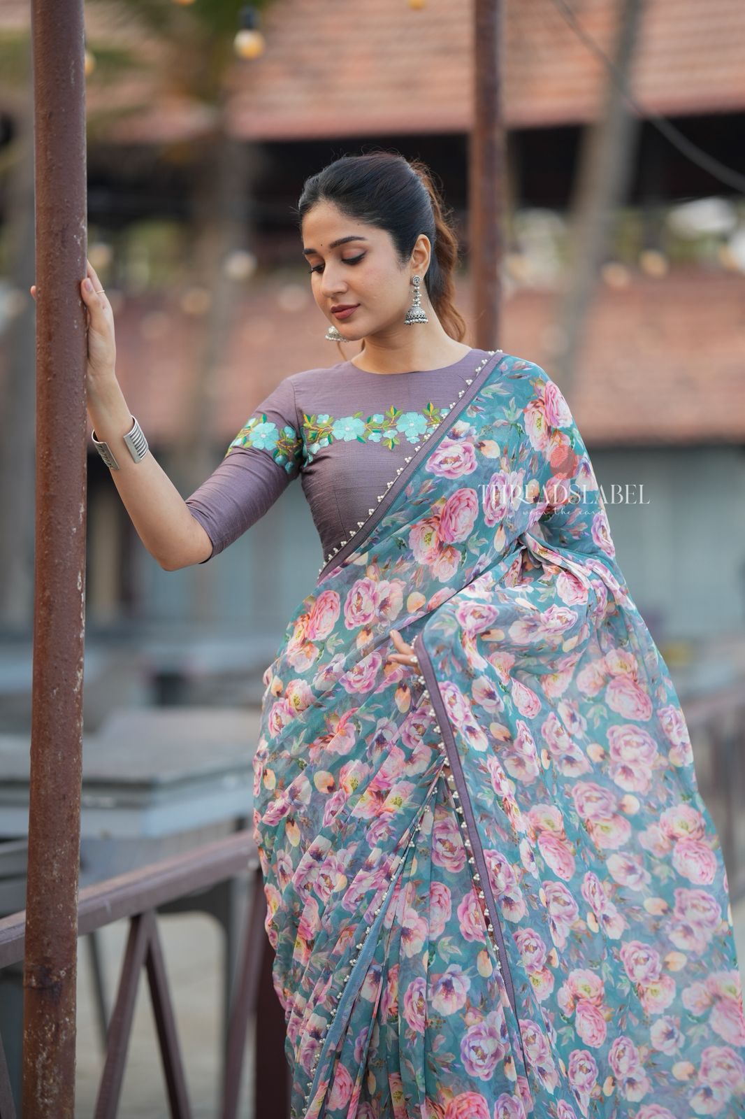 Blue floral georgette saree with grey embroidery blouse
