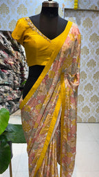Yellow viscose floral saree with hand worked blouse
