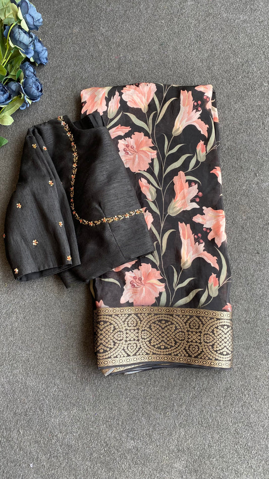 Black floral organza saree with black jewelled blouse