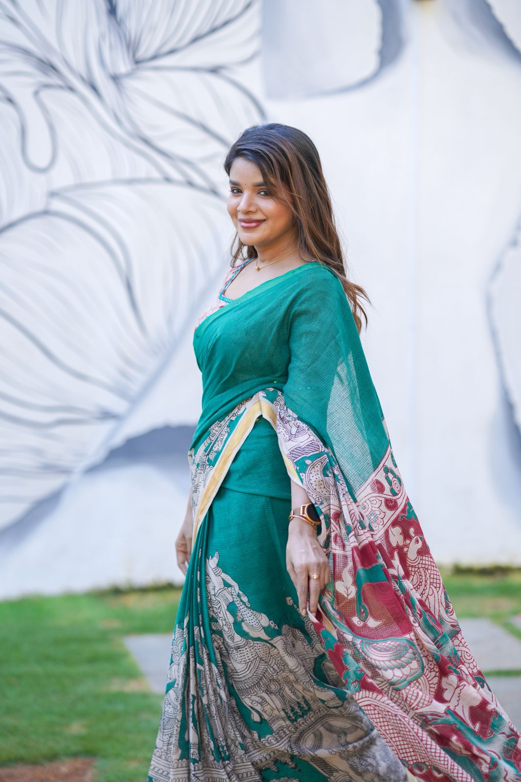 Green kota saree with kalamkari work blouse