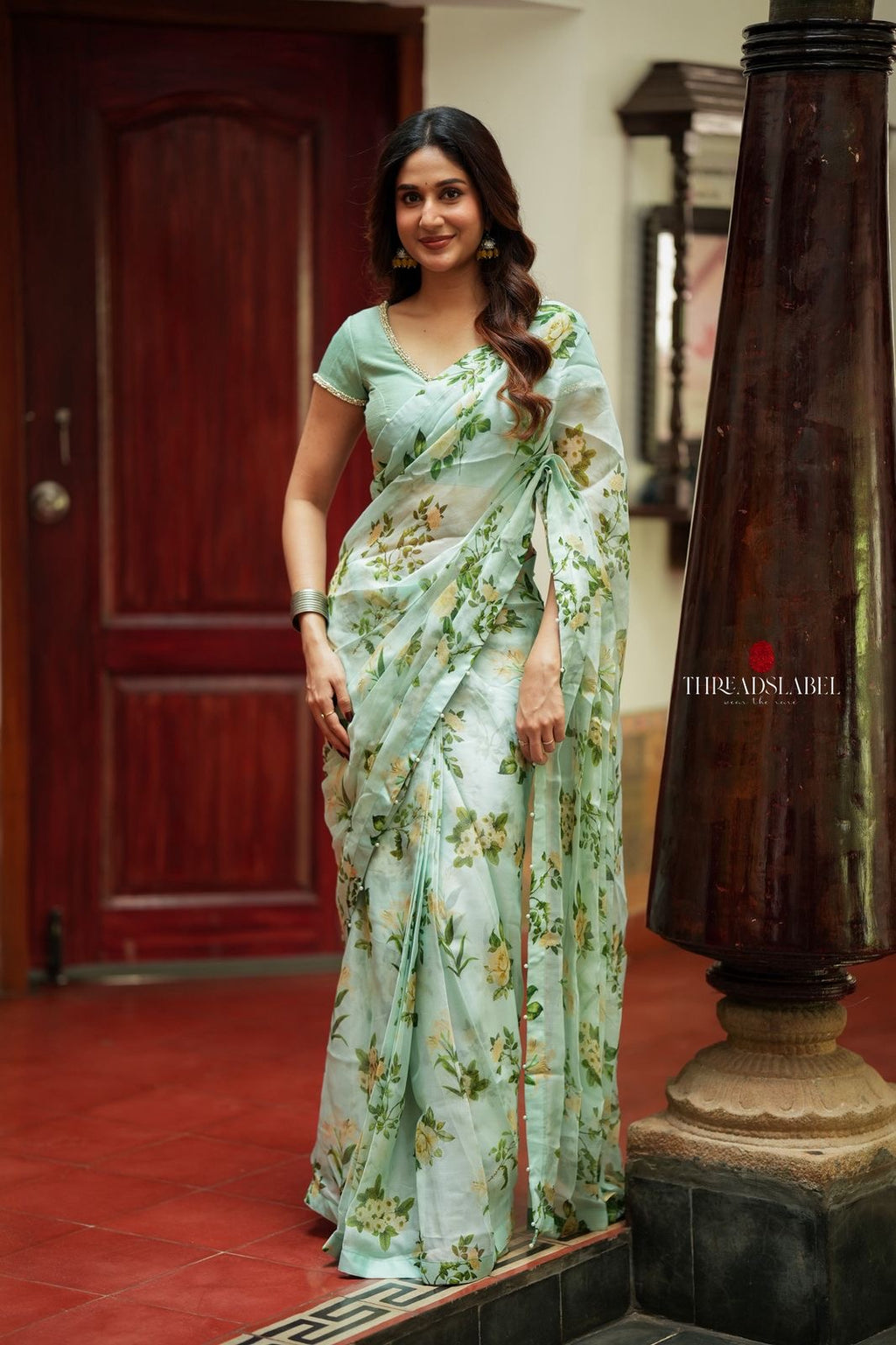 Sea green viscose jute floral saree (only saree)