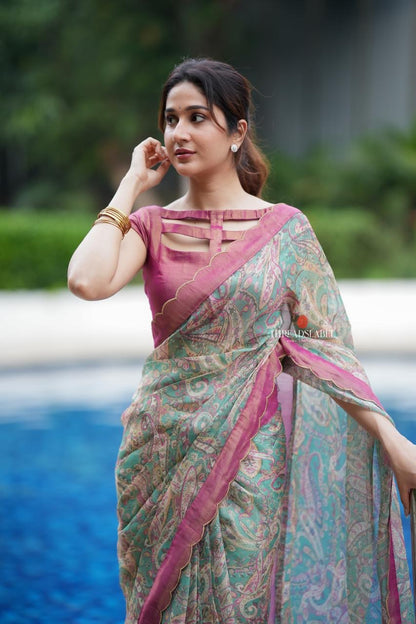Jade green viscose jute saree with pink tissue blouse