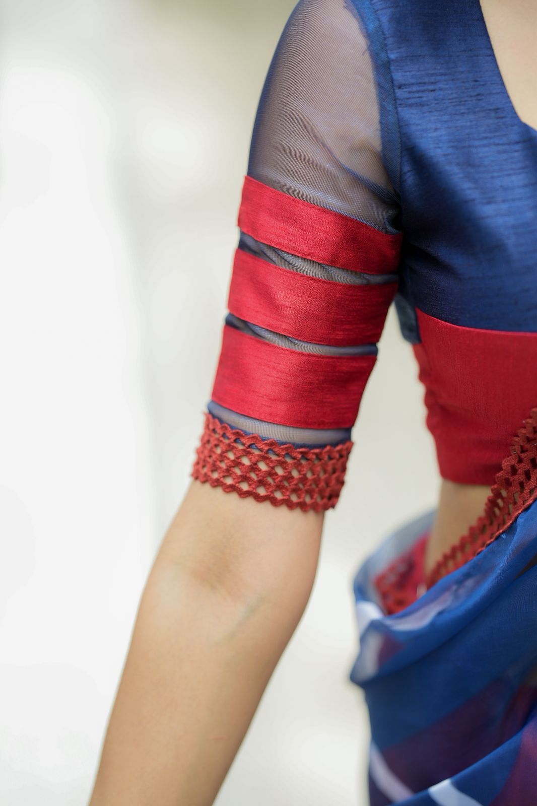 Blue maroon organza saree with patterned blouse