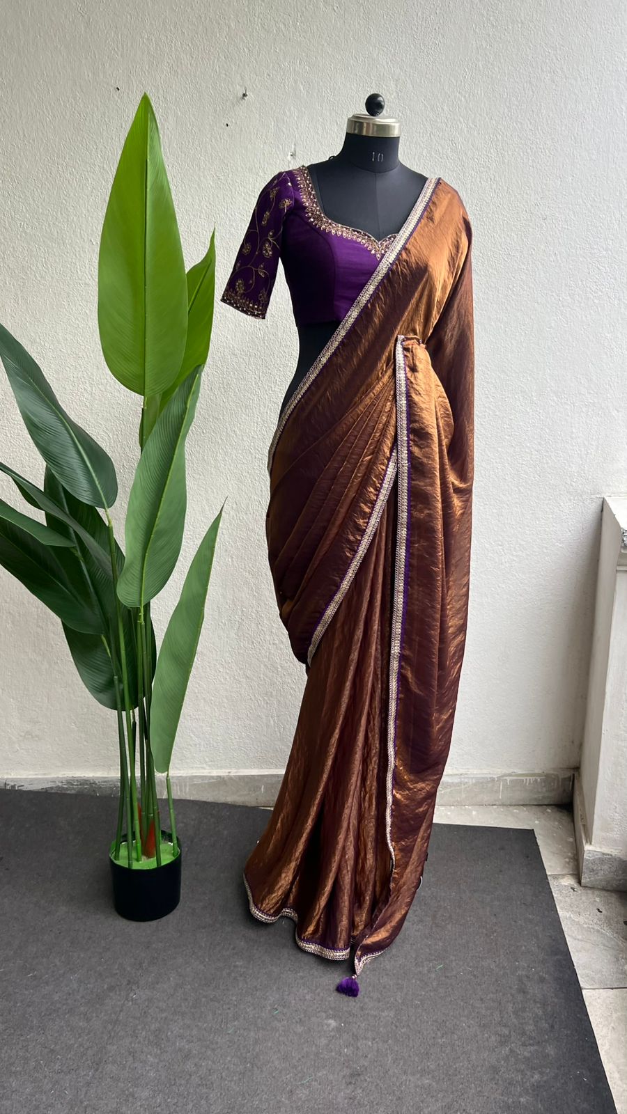 Coffee tissue saree with purple heavy hand work blouse