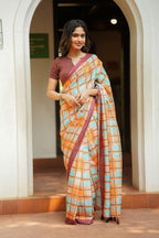 Multi checked kota saree with brown embroidery blouse