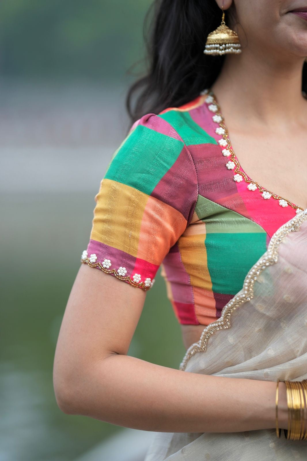 Beige georgette tissue saree with multi hand work blouse