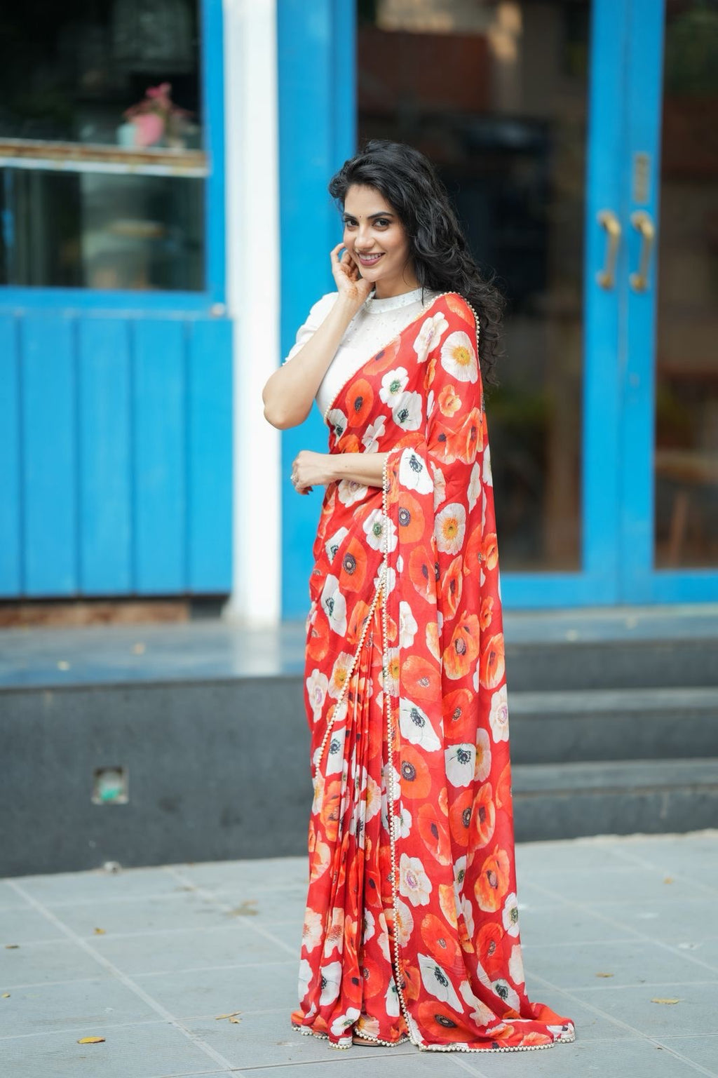 Orange red chinnon silk saree with white organza blouse