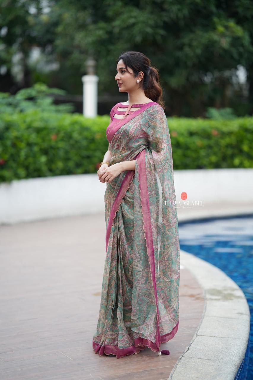 Jade green viscose jute saree with pink tissue blouse