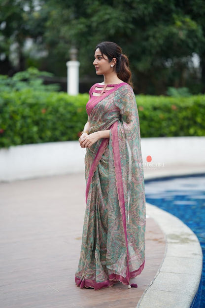 Jade green viscose jute saree with pink tissue blouse